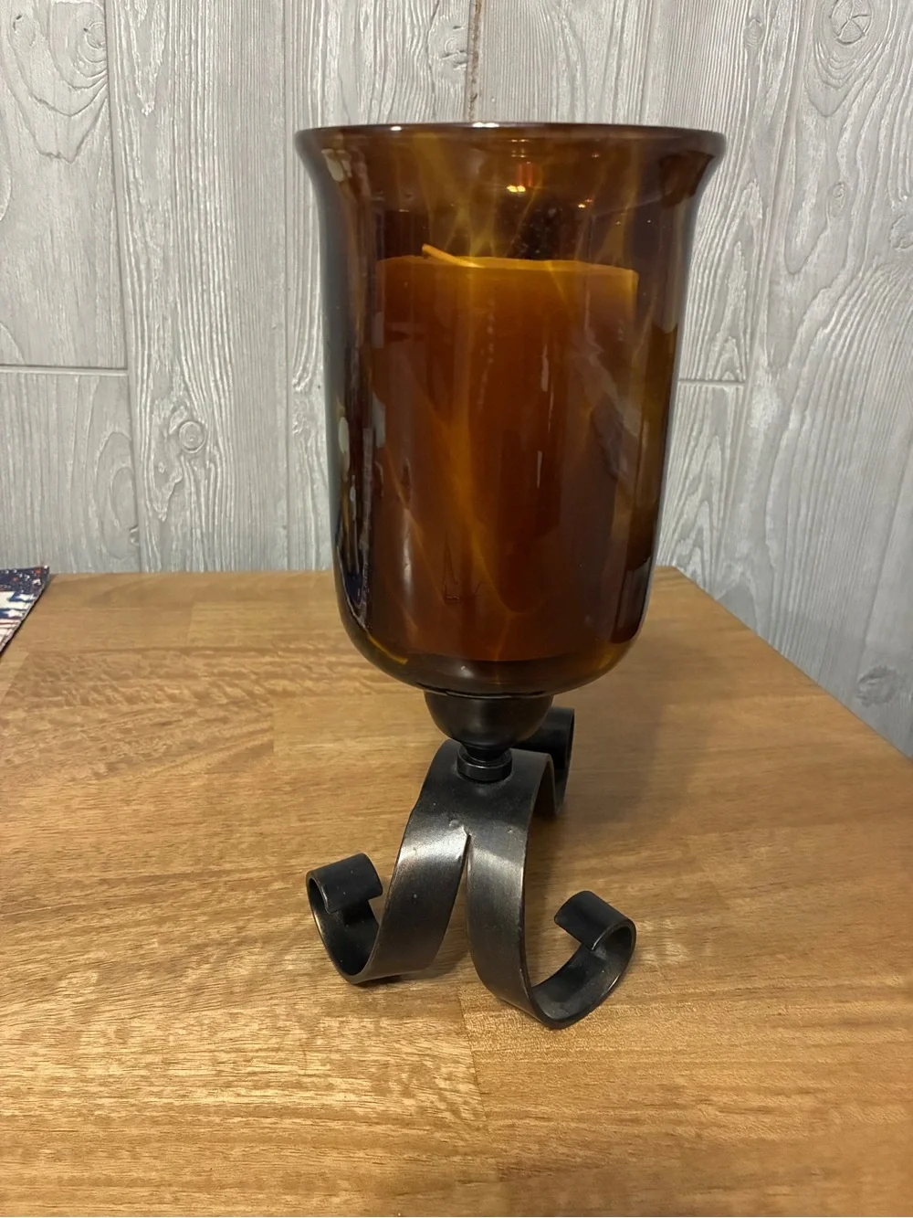 Amber Glass Hurricane Candle Holder with Black Scroll Base 11” x7”